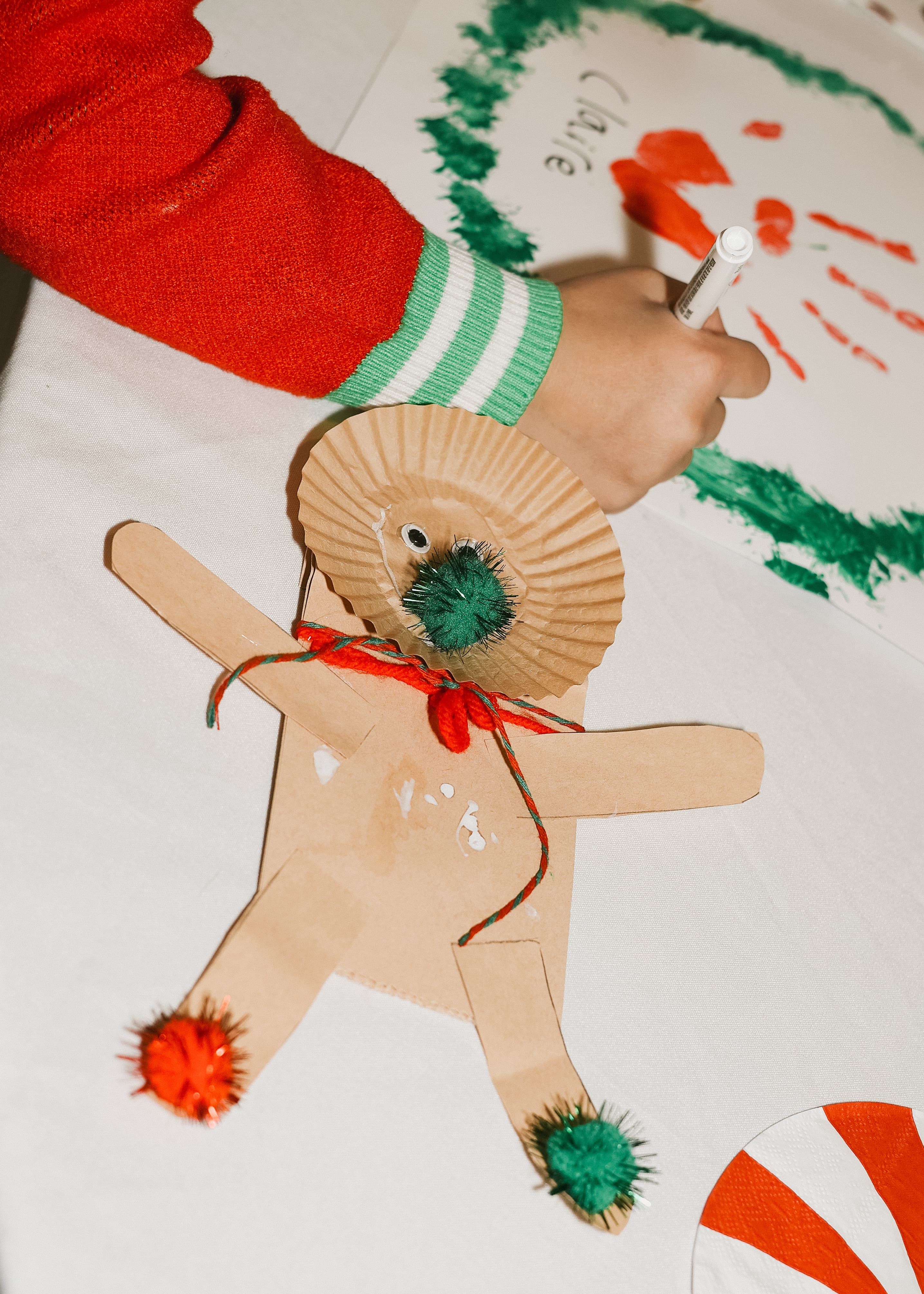 Children creating art together at a table