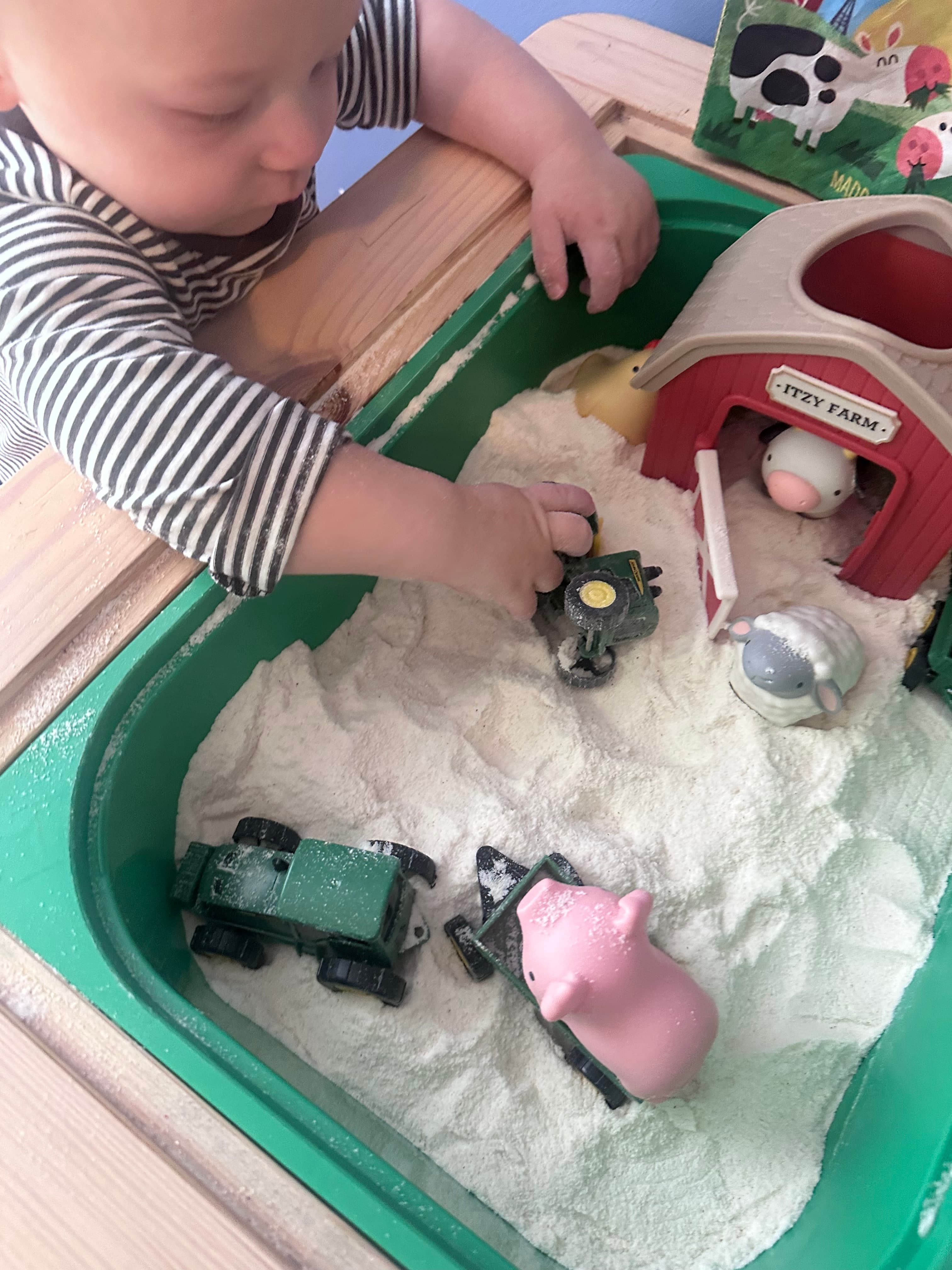 Young children playing with colorful educational toys
